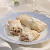 ham-and-cheese-strudels-with-mustard-sauce-food image