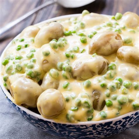 cheesy-creamed-peas-and-potatoes-spicy-southern image