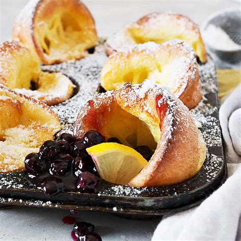mini-lemon-sugar-dutch-baby-pancakes-with-blueberry image