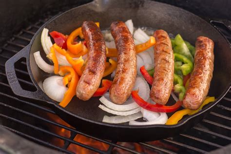 grilled-sausage-and-peppers-in-a-cast-iron-skillet image
