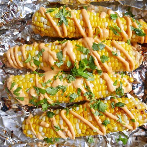 foil-packet-corn-with-sriracha-mayo-drizzle image