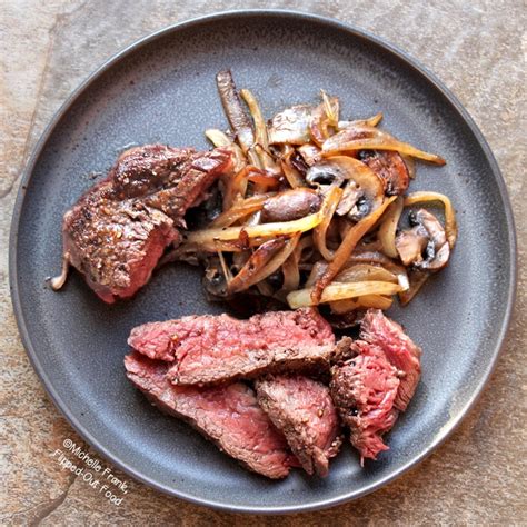 grilled-ribeye-steaks-with-caramelized-onions-and-mushrooms image