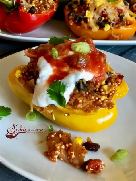 mexican-quinoa-stuffed-peppers-swirls-of-flavor image