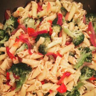garlic-olive-oil-pasta-with-broccoli-onions-and-tomatoes image