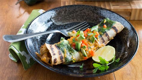 chicken-enchiladas-with-fire-roasted-poblano-peppers image