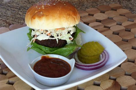 texas-burgers-with-barbecue-sauce-and-coleslaw image