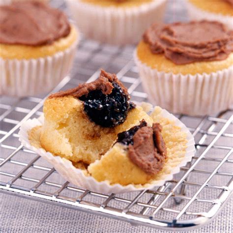 chocolate-filled-mini-vanilla-cupcakes-healthy image
