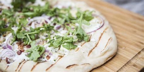 grilled-pizza-with-ricotta-pancetta-and-arugula image