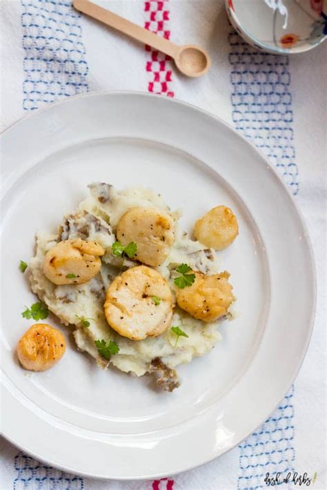 seared-scallops-with-garlic-mashed-potatoes-dash-of-herbs image