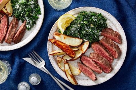 seared-steaks-with-lemon-parmesan-kale-roasted image