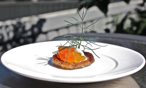 buckwheat-blinis-with-crme-frache-and-salmon-roe image