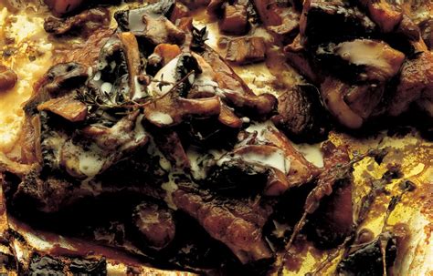 pork-chops-baked-with-wild-mushrooms-and-creme-fraiche image