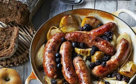 baked-sausages-with-apples-onion-raisins-and-cider image