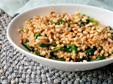 israeli-pearl-couscous-with-spinach-and-pine-nuts image