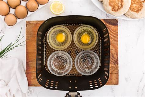 air-fryer-poached-eggs-fork-to-spoon image