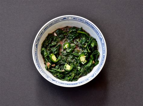 stir-fried-spinach-with-fermented-red-tofu-the image