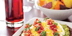 southwestern-layered-dip-with-chips-womans-day image