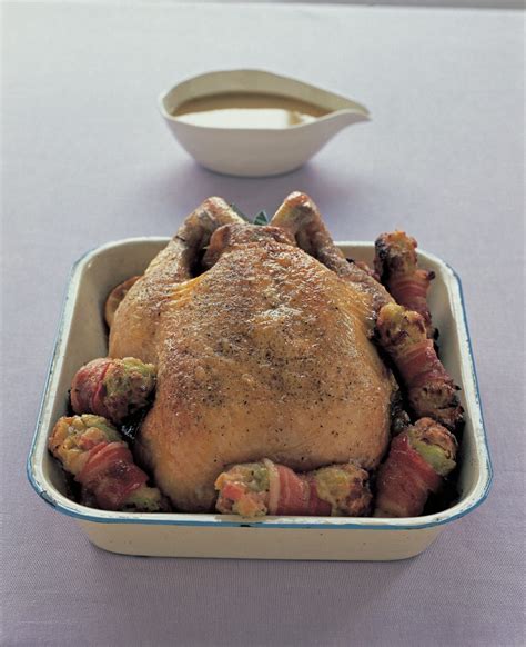 roast-chicken-with-crunchy-stuffing-bacon-rolls image
