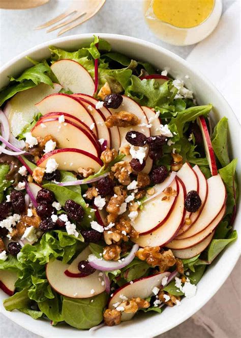 apple-salad-with-candied-walnuts-and-cranberries image