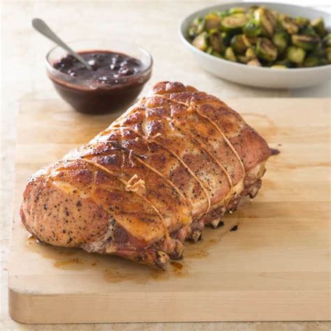 slow-roasted-bone-in-pork-rib-roast-cooks-illustrated image