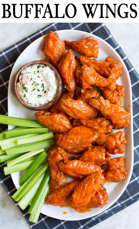 baked-buffalo-wings-with-blue-cheese-dip-cooking image