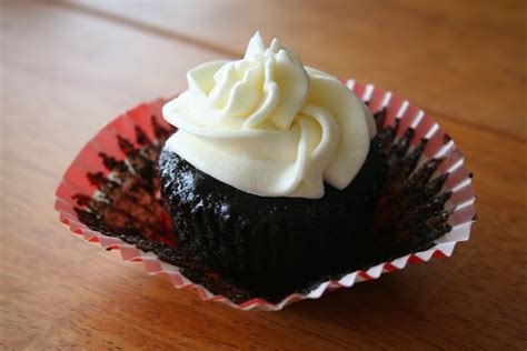 devils-food-cupcakes-with-buttercream-frosting image