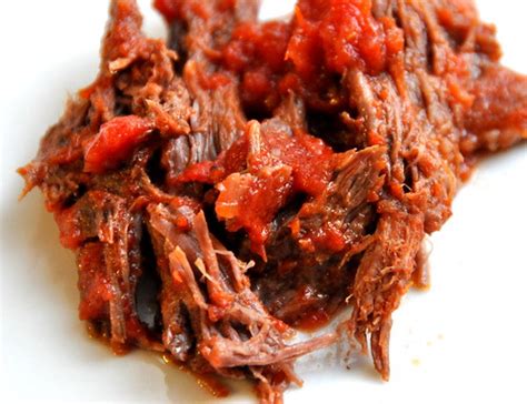 oven-braised-beef-with-tomato-sauce-garlic-the image