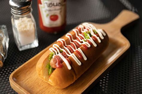 sticky-cider-onion-hot-dogs-cranleigh-magazine image