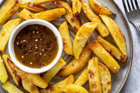 oven-baked-chip-shop-chips-curry-sauce image