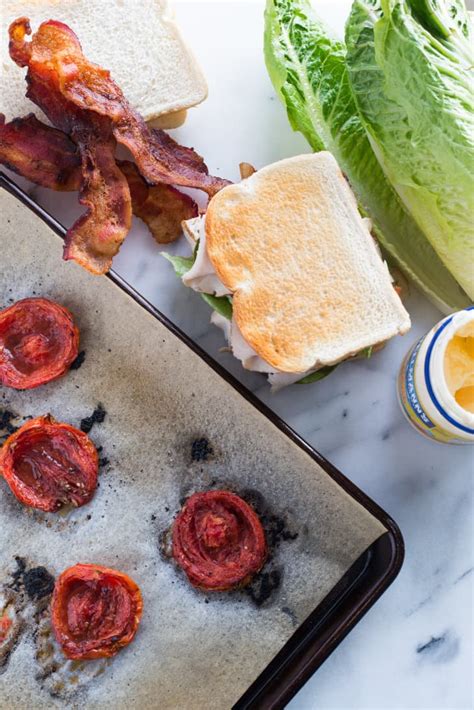 recipe-roasted-tomato-and-turkey-club-sandwich-kitchn image