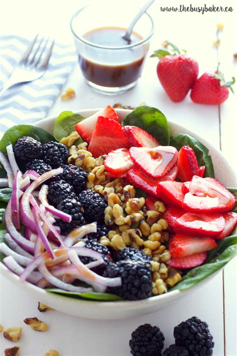berry-walnut-spinach-salad-with-maple-vinaigrette image