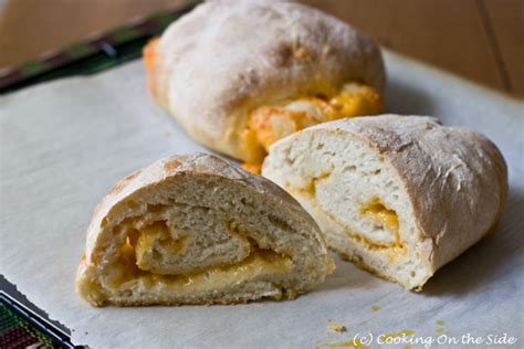 recipe-cheddar-stuffed-crusty-loaves-cooking-on image