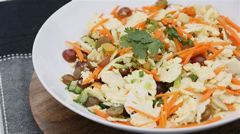 cauliflower-and-carrot-slaw-with-honey-curry-vinaigrette image