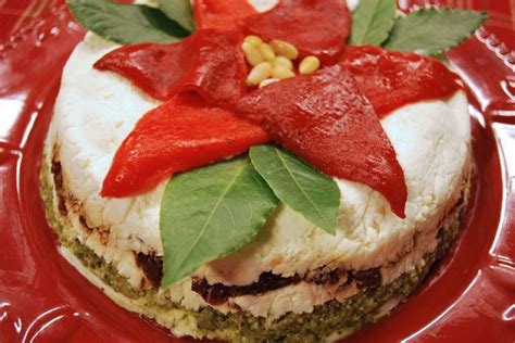 layered-pesto-and-sundried-tomato-dip-the-cooking image
