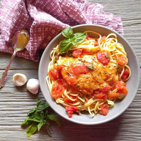 basil-garlic-chicken-with-a-buttery-tomato-sauce image