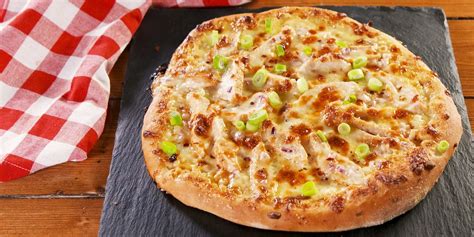 how-to-make-chicken-alfredo-pizza-delish image
