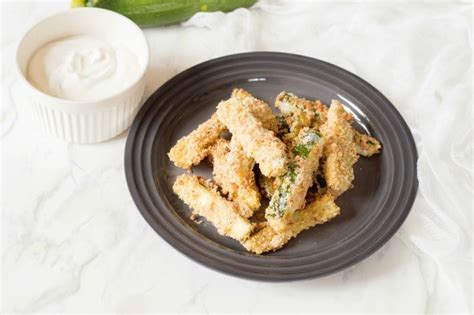 easy-baked-zucchini-fries-with-creamy-garlic-dip image