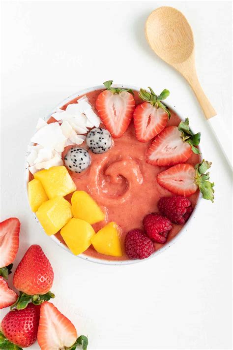 strawberry-mango-smoothie-bowl-purely-kaylie image