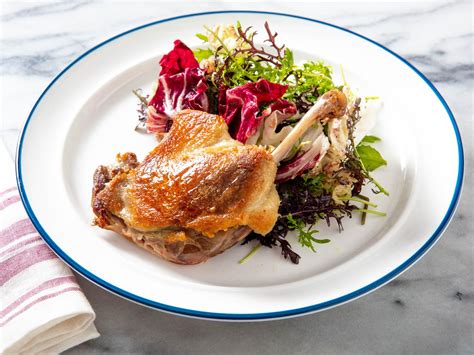 crispy-duck-confit-with-mixed-bitter-greens-salad image