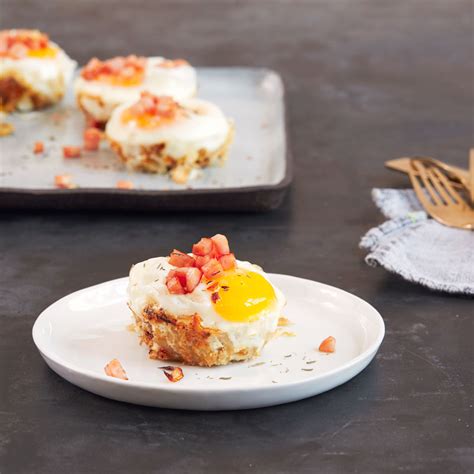 baked-eggs-with-hash-browns-and-canadian-bacon image