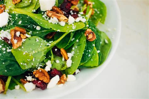 cranberry-spinach-salad-with-creamy-citrus-dressing image