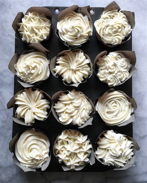 devils-food-cupcakes-with-cream-cheese-icing image
