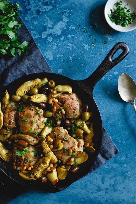 one-pan-chicken-artichoke-olive-skillet-running-to image