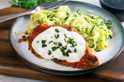 baked-chicken-parmesan-with-zucchini-pasta image