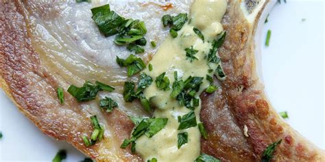 best-creamy-dijon-pork-chops-recipe-delishcom image