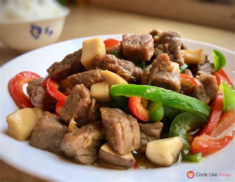 chinese-stir-fry-king-oyster-mushroom-with-beef image