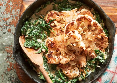 skillet-roasted-cauliflower-steaks-with-jalapeo-creamed-spinach image