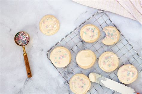 mascarpone-buttercream-frosted-cookies-the-classy image