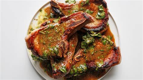 juicy-pan-seared-pork-chops-with-citrus-dressing image