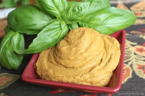 white-bean-hummus-with-sun-dried-tomatoes-and-basil image